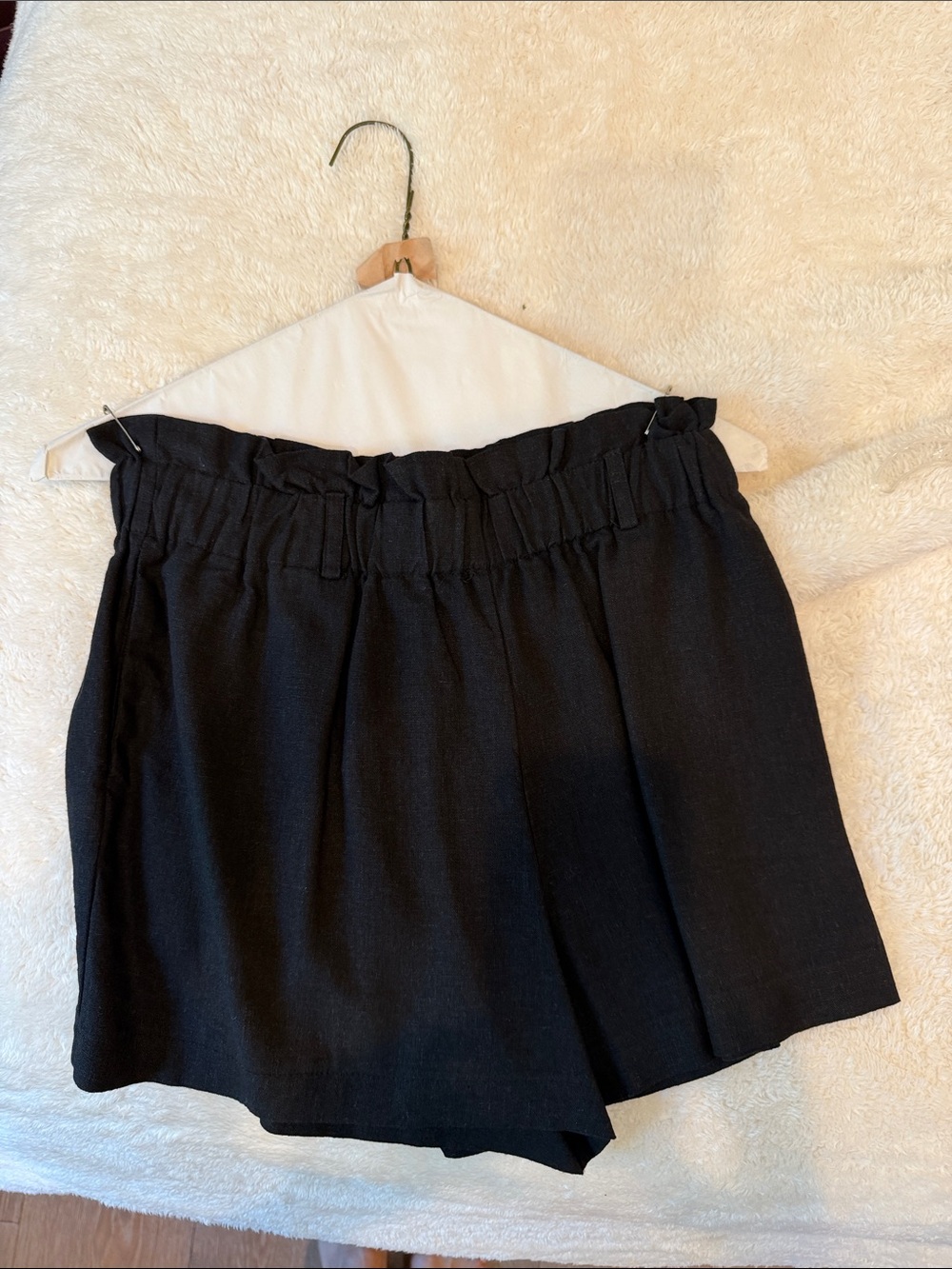 Double Zero Black Knit Garment with White Label
